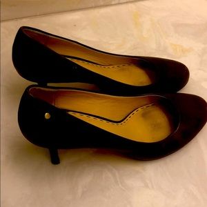 Brown leather coach pumps